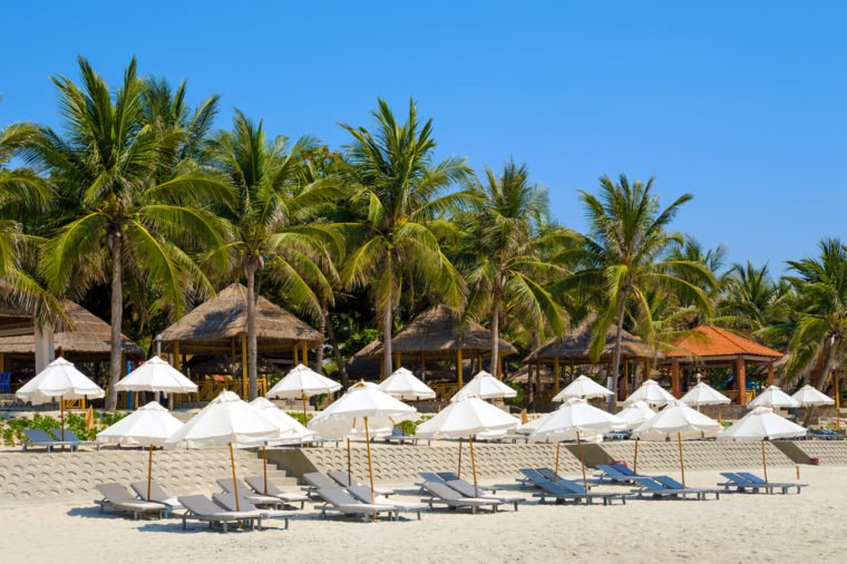 Doc Let beach, Vietnam. Umbrellas and sunbeds.