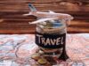 6 Essential Tips for Budgeting Your First Cruise Vacation Collecting money for travel, money savings in a glass jar with world map