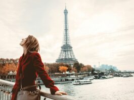 Style girl in Paris with Eiffel tower on background